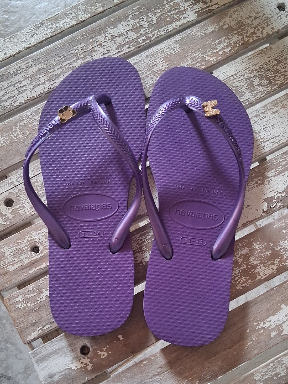 Havaianas Purple Flip Flops with Gold Charms